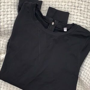 Lulu back zip black shirt.